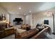 Cozy living room featuring comfortable seating, TV and carpet at 10441 W Remington Dr, Littleton, CO 80127