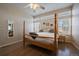 Spacious bedroom with natural light, featuring wood floors, neutral tones, and plenty of space at 10441 W Remington Dr, Littleton, CO 80127