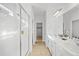 Double vanity bathroom with a walk-in shower and neutral color palette at 838 N Yantley St, Aurora, CO 80018