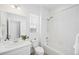 Clean bathroom with a shower/tub combo and white vanity at 838 N Yantley St, Aurora, CO 80018