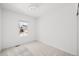 Bright bedroom with a window and neutral carpeting at 838 N Yantley St, Aurora, CO 80018