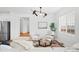 Living room with a sectional sofa, two armchairs and a modern coffee table at 838 N Yantley St, Aurora, CO 80018