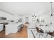 Bright and airy open living space, seamlessly connecting kitchen, dining, and living areas at 838 N Yantley St, Aurora, CO 80018