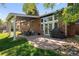 Spacious backyard with patio, outdoor dining area, and well-maintained lawn, ideal for entertaining and outdoor activities at 3767 E Phillips Cir, Centennial, CO 80122