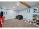 Finished basement area with a cozy seating area, playful decor, and plenty of room to relax at 3767 E Phillips Cir, Centennial, CO 80122
