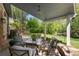 Inviting backyard patio featuring an outdoor dining set, perfect for relaxing and enjoying the serene outdoor space at 3767 E Phillips Cir, Centennial, CO 80122