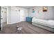 Charming bedroom featuring soft carpet, soothing wall colors, and stylish wall art at 22678 E Lake Pl, Centennial, CO 80015