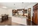 Spacious open kitchen featuring granite countertops, stainless appliances and ample storage at 9182 Ridgegate Pkwy, Lone Tree, CO 80124