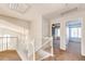 Second story hallway leading to the bedrooms at 1941 Fox Fire St, Highlands Ranch, CO 80129