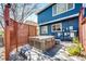Backyard view of a relaxing hot tub featuring a lattice screen for privacy at 1941 Fox Fire St, Highlands Ranch, CO 80129
