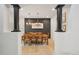 Elegant dining room with modern lighting, spacious table, and stylish decor at 21434 E Greenwood Pl, Aurora, CO 80013