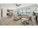 Spacious living room with an open layout, seamlessly connected to the dining and kitchen areas at 21434 E Greenwood Pl, Aurora, CO 80013