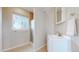 Bathroom with white vanity and walk-in shower at 7785 E 13Th Ave, Denver, CO 80220