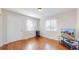 Living room with hardwood floors and ample natural light at 7785 E 13Th Ave, Denver, CO 80220