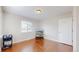 Open living room with hardwood floors at 7785 E 13Th Ave, Denver, CO 80220
