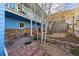 Inviting backyard with stone patio, potted plants and greenery at 2041 Virginia St, Idaho Springs, CO 80452