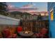 Backyard with a fire pit and seating area for outdoor relaxation with mountain views at 2041 Virginia St, Idaho Springs, CO 80452