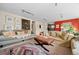 Spacious living room featuring comfortable seating, a vibrant area rug, and elegant decor at 2041 Virginia St, Idaho Springs, CO 80452