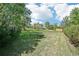 Expansive backyard with mature trees and plenty of space for outdoor activities at 235 Summit Cir, Lafayette, CO 80026