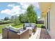 Backyard featuring an outdoor patio set on a wooden deck with a lush green lawn at 235 Summit Cir, Lafayette, CO 80026