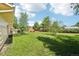 Lush backyard featuring a deck and private space at 235 Summit Cir, Lafayette, CO 80026