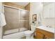 Bathroom with sliding glass door shower and light wood vanity at 235 Summit Cir, Lafayette, CO 80026