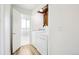 Bright laundry room area showcasing modern washer and dryer at 235 Summit Cir, Lafayette, CO 80026