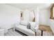 Cozy living room with light hardwood floors and a comfortable couch and a view of the stairs at 235 Summit Cir, Lafayette, CO 80026
