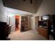 Bedroom with vaulted ceiling, neutral carpet, and a walk-in closet. Ready for your personal touch at 4933 S Carson St # 212, Aurora, CO 80015