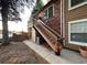 Exterior view showcases a staircase leading to an apartment or additional unit, adding unique charm at 4933 S Carson St # 212, Aurora, CO 80015