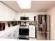 Modern kitchen featuring stainless steel appliances and ample countertop space at 4933 S Carson St # 212, Aurora, CO 80015