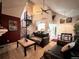 Inviting living room featuring a spiral staircase and vaulted ceilings at 4933 S Carson St # 212, Aurora, CO 80015