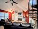 Cozy living room features a fireplace and ample natural light at 4933 S Carson St # 212, Aurora, CO 80015