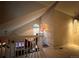 Loft area offering additional living space with a view of the lower level at 4933 S Carson St # 212, Aurora, CO 80015
