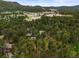 Property in a tranquil wooded setting, features backyard playground and nearby community resources at 26499 West St, Conifer, CO 80433