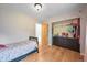 Bedroom features hardwood flooring, closet and dresser at 26499 West St, Conifer, CO 80433