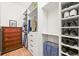 Spacious walk-in closet with organized shelves, drawers, and storage for clothing and shoes at 26499 West St, Conifer, CO 80433