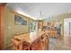 Inviting dining room with a rustic wooden table and chairs, perfect for Gathering meals and gatherings at 26499 West St, Conifer, CO 80433