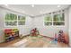 Spacious playroom with two windows and toys for hours of playtime at 26499 West St, Conifer, CO 80433