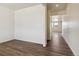 Bright entryway with laminate flooring and neutral paint, offering a clean, modern aesthetic at 760 N Deer Park St, Watkins, CO 80137