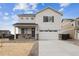 Charming two-story home with stone accents and a spacious two-car garage at 760 N Deer Park St, Watkins, CO 80137