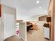 Loft with a piano, stairs, and neutral walls at 10565 Kicking Horse Dr, Littleton, CO 80125