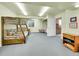 Spacious playroom with bunk beds, carpeted flooring, and recessed lighting at 10565 Kicking Horse Dr, Littleton, CO 80125