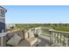 Relaxing deck area with comfortable seating and a stunning view of the neighborhood park at 7702 E 159Th Ave, Thornton, CO 80602