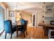 Cozy dining area with hardwood floors, comfortable seating, and warm lighting at 765 Columbine St # C203, Breckenridge, CO 80424