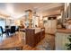 Charming kitchen and dining area with custom cabinetry and hardwood floors at 765 Columbine St # C203, Breckenridge, CO 80424