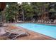 Exterior pool with ample poolside seating and nearby apartment building at 765 Columbine St # C203, Breckenridge, CO 80424