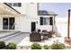 Outdoor patio featuring comfortable seating, string lights, and a well-maintained exterior at 16300 Paris Way, Brighton, CO 80602