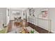 Open concept dining room with modern lighting and easy access to the kitchen at 2950 Hudson St, Denver, CO 80207