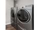 Modern washer and dryer units in a dedicated laundry area at 2950 Hudson St, Denver, CO 80207
